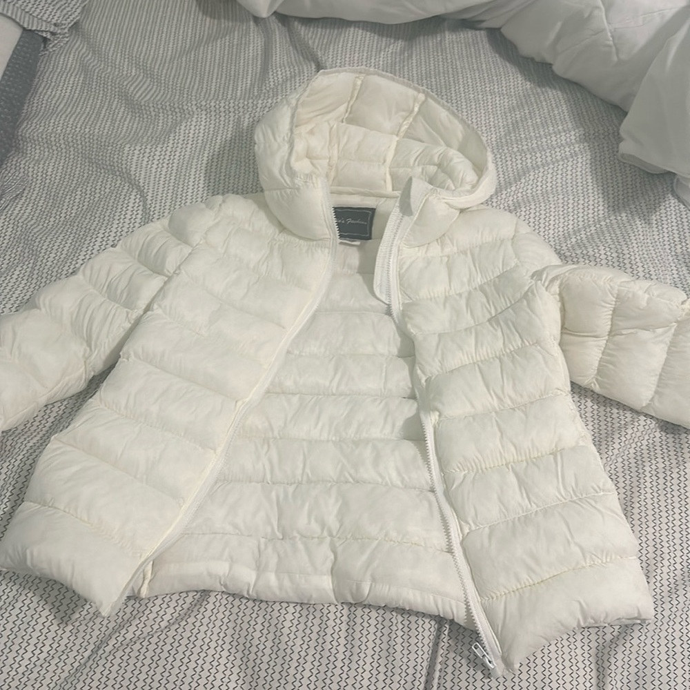 Almost new , white jacket for a boy or a girl